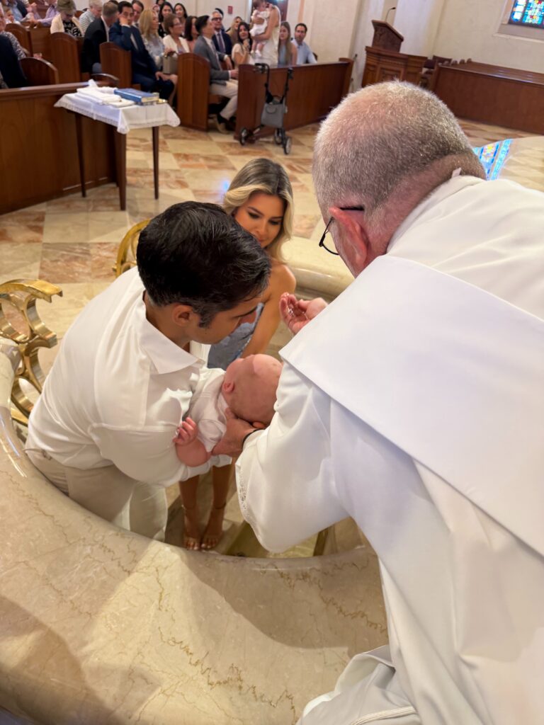 Liam got baptized 5.15.26